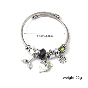 Detail of silver stainless steel charm bracelet with dolphin charms and size 5.5cm 22g