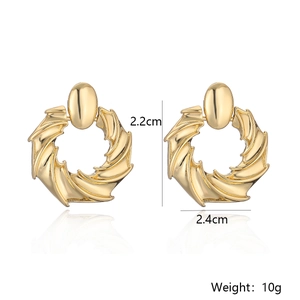 Detailed view of gold irregular swirl earrings with dimensions 2.4cm width and 2.2cm height