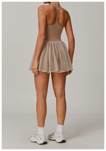 Detailed back view of a breathable mesh tennis dress with layers of lightweight tulle fabric
