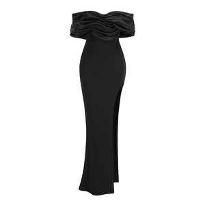 Detail of elegant black evening gown with ruffled neckline and high side slit design