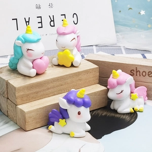 Set of four cute cartoon resin unicorn cake toppers in pastel colors for party decor