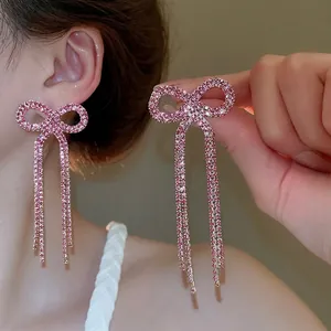 Pink rhinestone bow tassel earrings with silver needle in a delicate sweet style