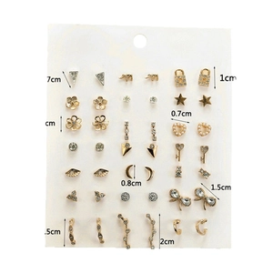 Golden earrings set with diverse shapes like elephants and stars and rhinestone details