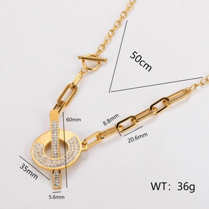 Collier trombone en acier doré avec fermoir OT en strass et détails de mesure affichés
