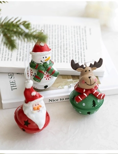 Detailed view of Christmas bells with Santa, Snowman and Reindeer resin figurines