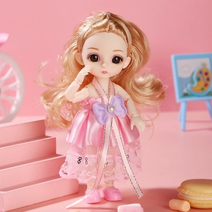 Poseable princess doll with curly blonde hair in a pink satin dress on a dreamy background
