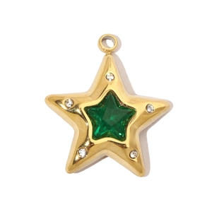 Detailed view of a gold star pendant with a green gemstone and zircon inlays