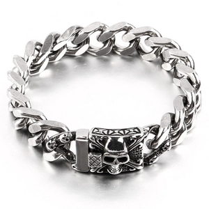 Detailed view of silver Cuban chain bracelet featuring a unique punk skull clasp design