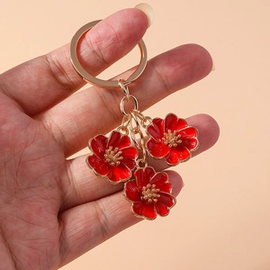 Handheld sweet red peach blossom alloy keychain with golden finish for handbags