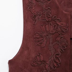 Burgundy suede vest with detailed floral embroidery and ethnic style textures