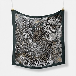 French vintage silk square scarf featuring dark green leopard art print and Paris pattern