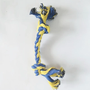 Close-up of blue and yellow braided cotton dog rope toy with double knot design