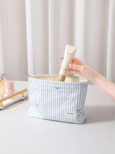 Trousse à maquillage rayée bleue et blanche avec broderie nœud et grande capacité de rangement