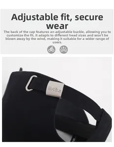 Detail of adjustable matte metal buckle with engraved letters on black cotton baseball cap