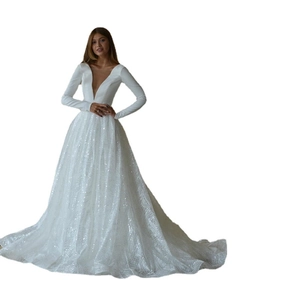 Elegant white long sleeve sequined wedding dress with deep V-neck and voluminous skirt