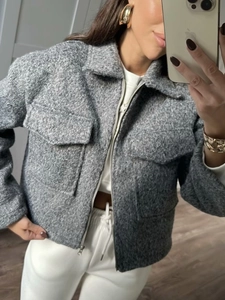 Women's dark gray cropped wool jacket with lapel collar and large flap pockets