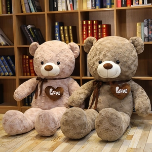 Detailed plush texture of teddy bear shells with Love heart embroidery and satin ribbons