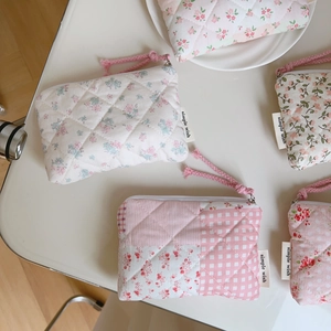 Pink floral quilted mini pouch with zipper for coins, lipstick and earphones