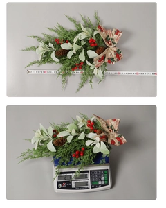Detailed view of Christmas swag with pine cones and berries showing 50cm length measure