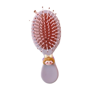 Cute cartoon purple hair brush for kids with massaging bristles and 3D girl figure décor