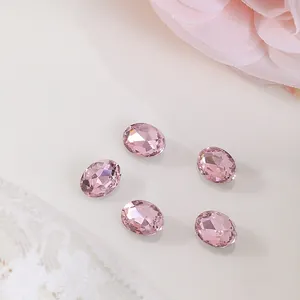 Macro shot of 6x8mm pink oval faceted rhinestones with D086 code for DIY nail art