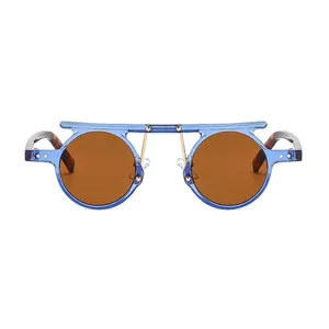 Retro round punk sunglasses with blue frame, brown lenses and star metal accents