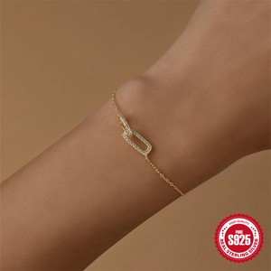 Elegant gold S925 sterling silver interlocking loop bracelet with pavé diamonds for women