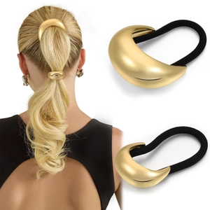 Detailed view of a minimalist golden metal ponytail holder with elastic band on model