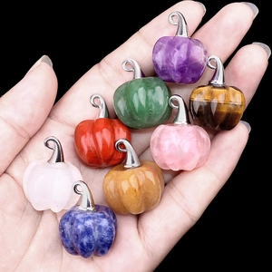 Set of eight assorted natural crystal pumpkin pendants with silver witch hat metal caps