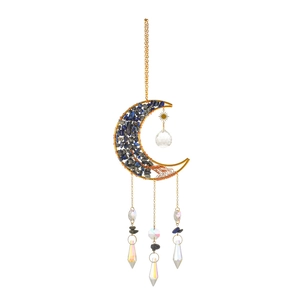Detail of moon sun catcher with blue-grey stones and rainbow crystal prisms