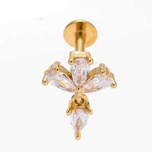 316L stainless steel gold labret piercing with flower zircon inlay on white background