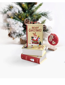 Detailed view of magic book style Christmas candy boxes with Santa and Snowman graphics