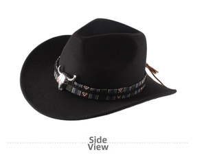 Side view of black felt cowboy hat with colorful ethnic band and silver bull head detail