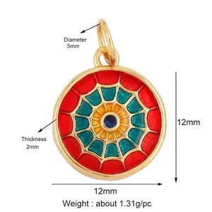Gold heart enamel pendant with sunburst spiderweb pattern and blue zircon center