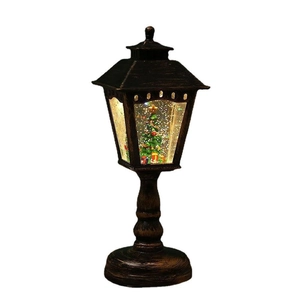 Vintage bronze Christmas lantern with LED light, rotating sequins, and mini Xmas tree