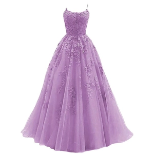 Detail of light purple lace appliques and multi-layer tulle on a formal evening gown
