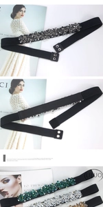 Detail of elastic waist belt featuring luxury crystal clusters and metal snap buttons