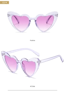Front and 45-degree views of purple glitter heart sunglasses with pink gradient lenses