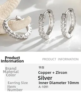 Detailed view of silver hoop earring with zircon inlay and 10mm inner diameter