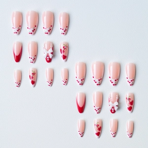 24-piece almond press-on nails with cherry, heart patterns and pearl bow decorations