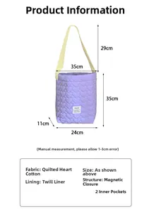 Detail view of purple heart quilted tote bag showing magnetic closure and inner pockets