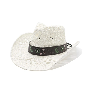 White hand-woven hollow straw cowboy hat with embroidered floral band and metal studs