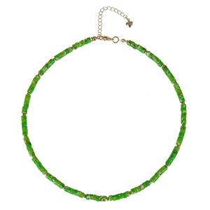 Detail of green turquoise beaded necklace with golden spacers and heart pendant