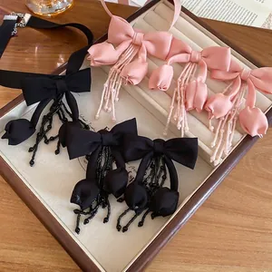 Elegant fabric bow tulip flower tassel choker and earrings jewelry set in soft display