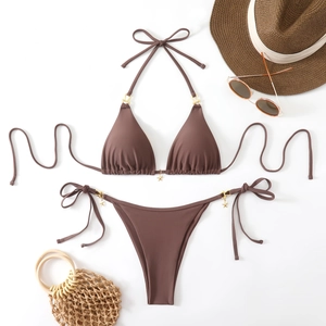 Dark brown halter bikini set with gold starfish charms and side-tie bottom on white background