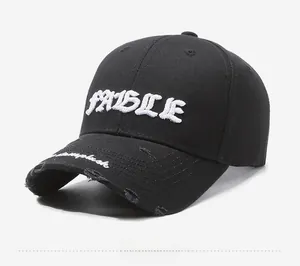 Detail of vintage distressed baseball cap with 3D embroidery and worn edges