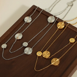 Vintage gold and silver titanium steel necklaces with diamond circular pendants