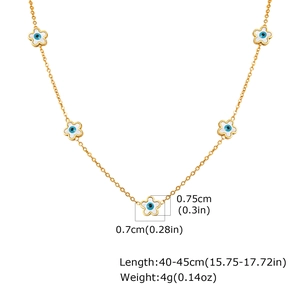 Detail showing dimensions of golden chain with white floral evil eye charms