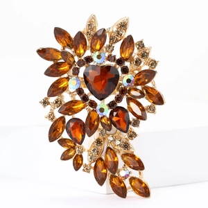 Detailed close-up of alloy flower brooch featuring amber marquise crystals and heart stone