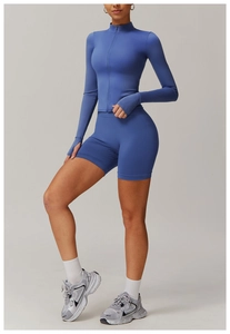 Blue quick-dry yoga set featuring zipper jacket with thumb holes and matching sports shorts